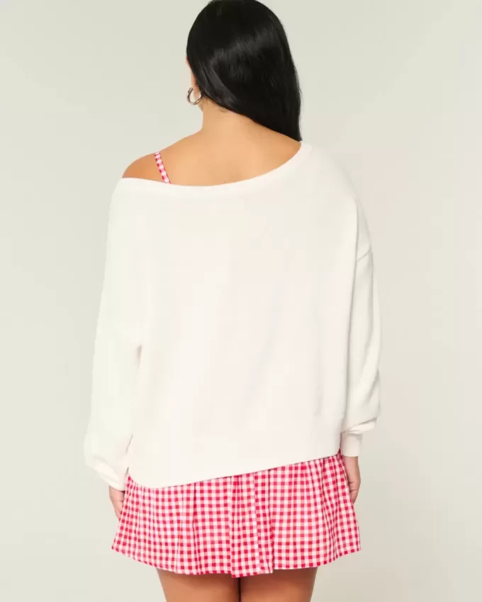 Lässiger, schulterfreier Pullover mit Flaggen- und Herzgrafik