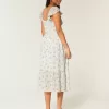 Midikleid mit Flatterärmeln und Doppelschnürung Midikleid mit Flatterärmeln und Doppelschnürung