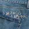 Mini-Skort aus besticktem Denim in mittlerer Waschung Mini-Skort aus besticktem Denim in mittlerer Waschung
