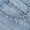 Mini-Skort aus Denim in heller Waschung mit Nieten Mini-Skort aus Denim in heller Waschung mit Nieten