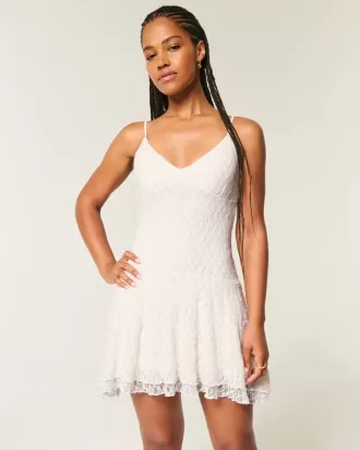 Minikleid mit asymmetrischem Spitzensaum