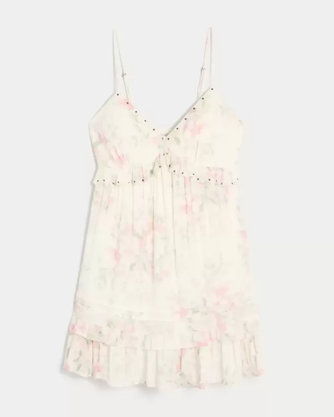Minikleid mit Rüschen und Nieten Minikleid mit Rüschen und Nieten