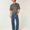 Mittelwaschbare Skater-Baggy-Jeans mit Sterngrafik Mittelwaschbare Skater-Baggy-Jeans mit Sterngrafik
