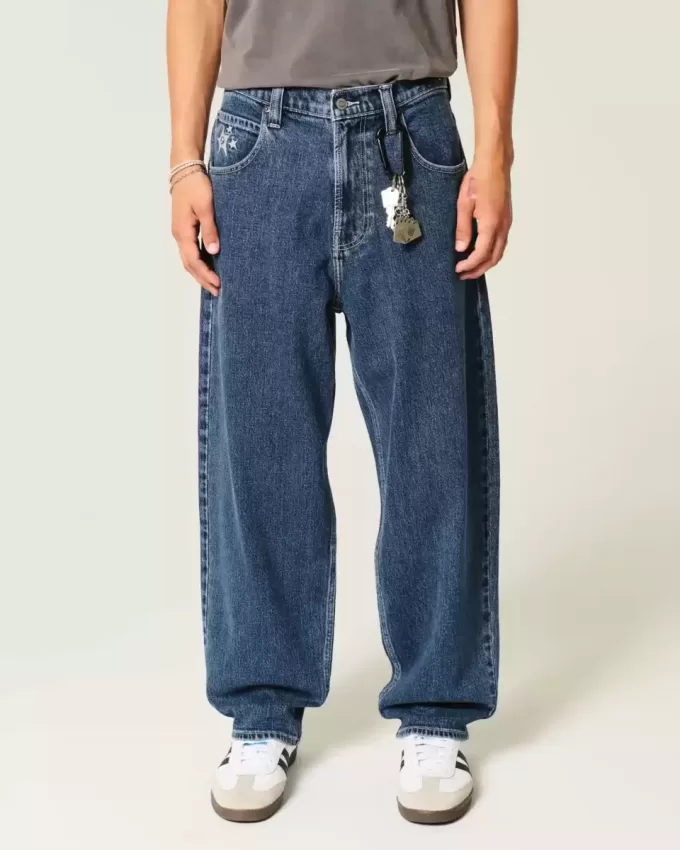 Mittelwaschbare Skater-Baggy-Jeans mit Sterngrafik Mittelwaschbare Skater-Baggy-Jeans mit Sterngrafik
