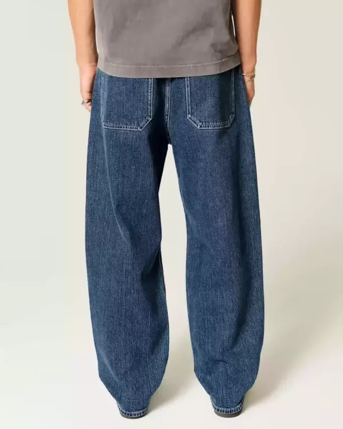 Mittelwaschbare Skater-Baggy-Jeans mit Sterngrafik Mittelwaschbare Skater-Baggy-Jeans mit Sterngrafik