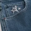 Mittelwaschbare Skater-Baggy-Jeans mit Sterngrafik Mittelwaschbare Skater-Baggy-Jeans mit Sterngrafik