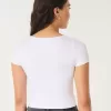 Nahtloses Baby-T-Shirt aus Stoff mit quadratischem Ausschnitt Nahtloses Baby-T-Shirt aus Stoff mit quadratischem Ausschnitt