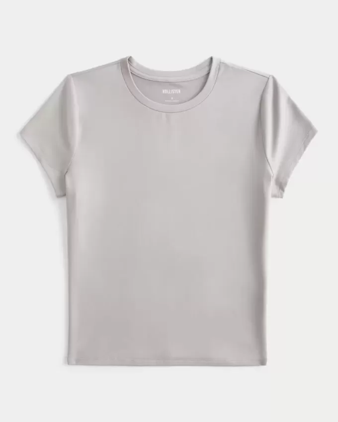 Weiches, nahtloses Longline-Baby-T-Shirt aus elastischem Stoff Weiches, nahtloses Longline-Baby-T-Shirt aus elastischem Stoff