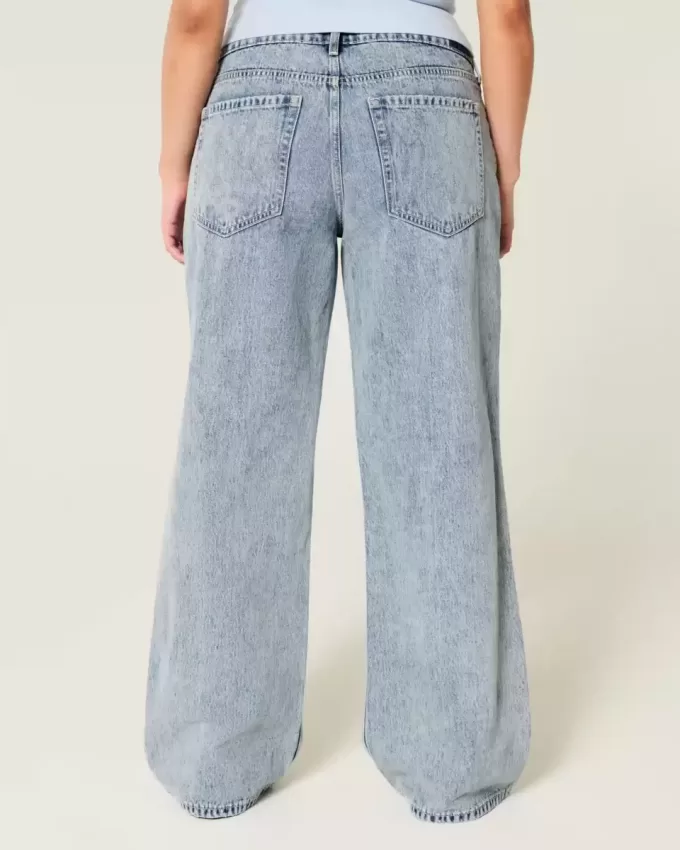 Niedrig geschnittene Baggy-Jeans mit Rissen in mittlerer Waschung Niedrig geschnittene Baggy-Jeans mit Rissen in mittlerer Waschung