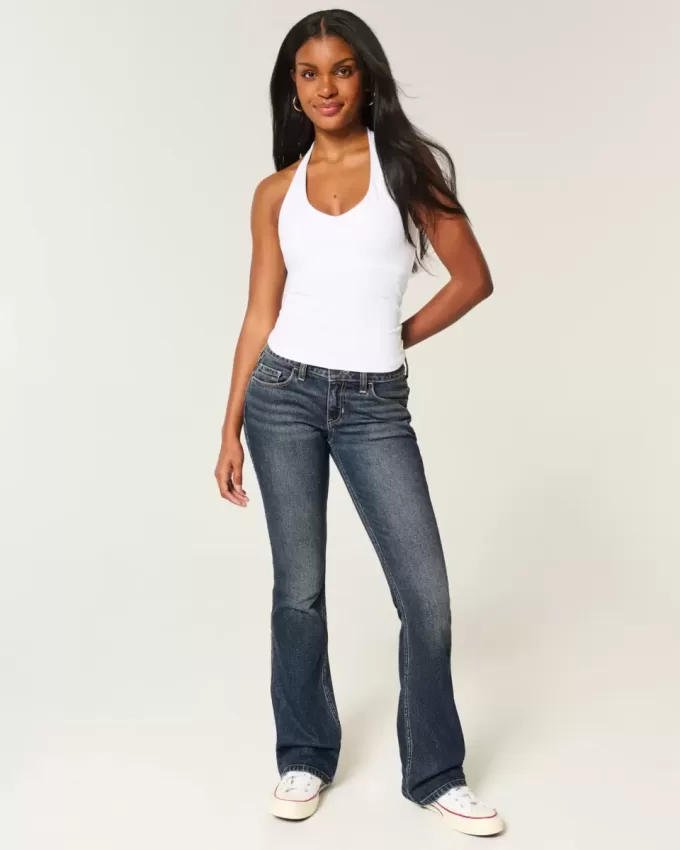 Niedrig geschnittene Bootcut-Jeans in dunkler Waschung mit Stickerei Niedrig geschnittene Bootcut-Jeans in dunkler Waschung mit Stickerei