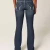 Niedrig geschnittene Bootcut-Jeans in dunkler Waschung mit Stickerei Niedrig geschnittene Bootcut-Jeans in dunkler Waschung mit Stickerei
