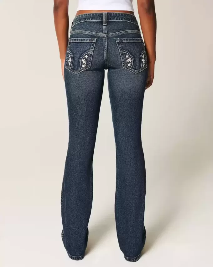 Niedrig geschnittene Bootcut-Jeans in dunkler Waschung mit Stickerei Niedrig geschnittene Bootcut-Jeans in dunkler Waschung mit Stickerei