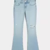 Niedrig geschnittene, zerrissene Bootcut-Jeans in heller Waschung mit Stickerei Niedrig geschnittene, zerrissene Bootcut-Jeans in heller Waschung mit Stickerei