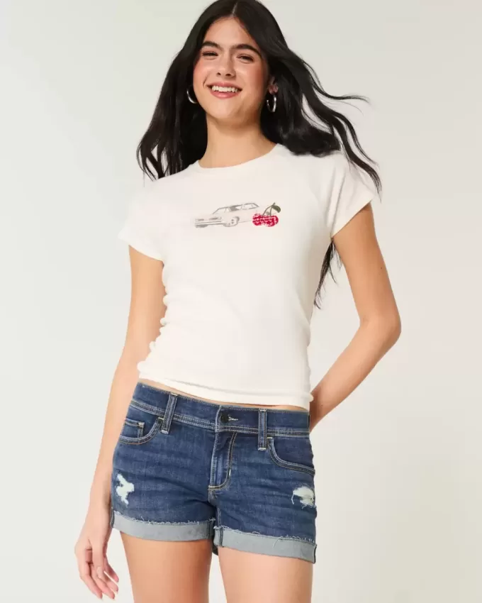 Niedrig geschnittene, zerrissene Shortie-Shorts aus dunkel gewaschenem Denim Niedrig geschnittene, zerrissene Shortie-Shorts aus dunkel gewaschenem Denim