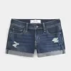 Niedrig geschnittene, zerrissene Shortie-Shorts aus dunkel gewaschenem Denim Niedrig geschnittene, zerrissene Shortie-Shorts aus dunkel gewaschenem Denim