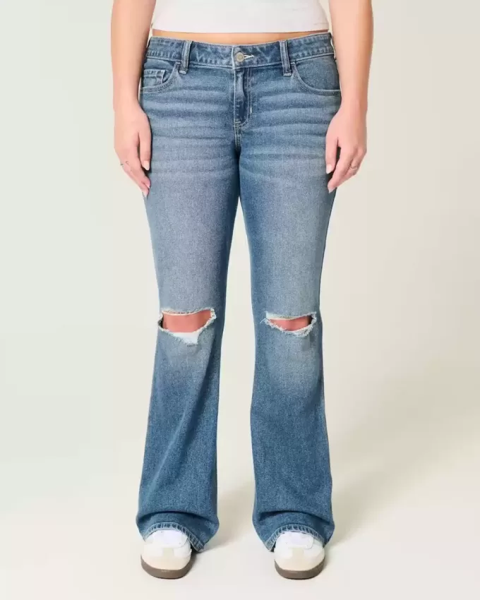 Niedrig sitzende Bootcut-Jeans mit Rissen in mittlerer Waschung Niedrig sitzende Bootcut-Jeans mit Rissen in mittlerer Waschung