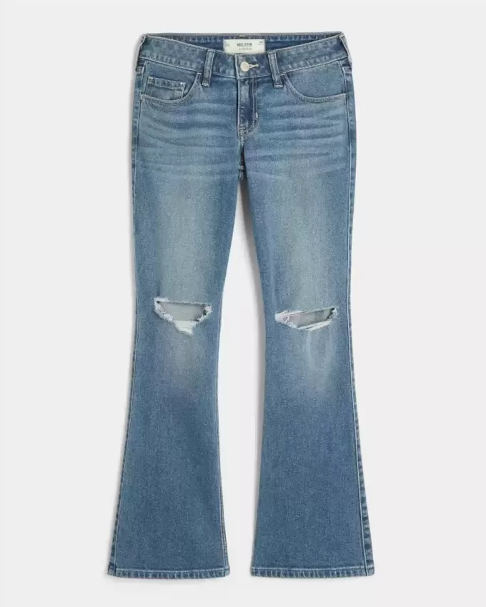 Niedrig sitzende Bootcut-Jeans mit Rissen in mittlerer Waschung Niedrig sitzende Bootcut-Jeans mit Rissen in mittlerer Waschung