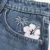 Niedrig sitzender Mini-Skort aus besticktem Denim Niedrig sitzender Mini-Skort aus besticktem Denim