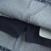 Niedrig sitzender Mini-Skort aus besticktem Denim Niedrig sitzender Mini-Skort aus besticktem Denim