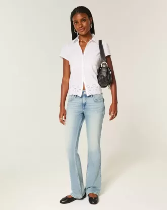 Niedrige Bootcut-Jeans mit mittlerer Waschung und Schmetterlingsstickerei