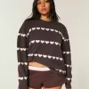 Oversize-Pullover mit Rundhalsausschnitt und Herzmuster Oversize-Pullover mit Rundhalsausschnitt und Herzmuster