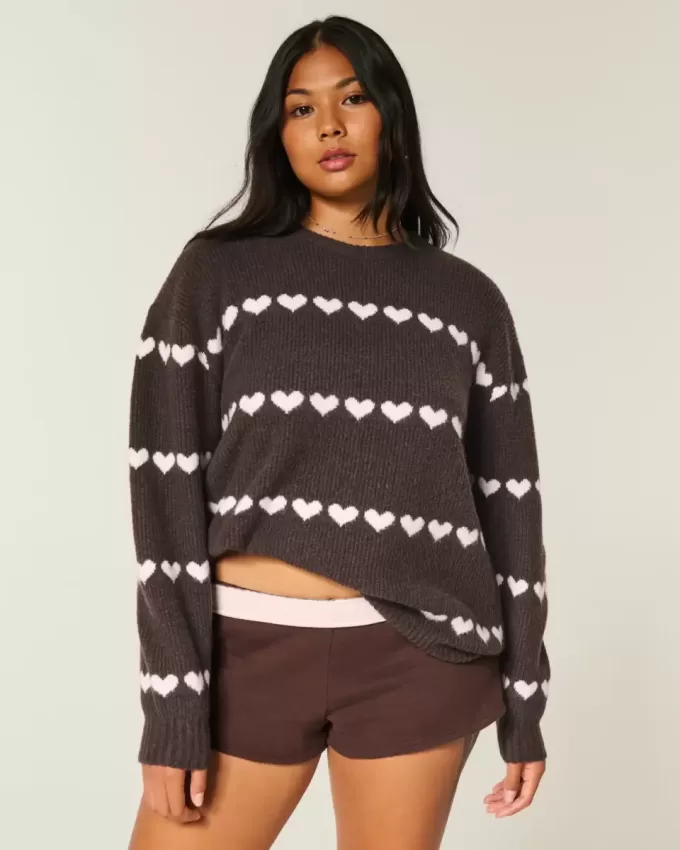 Oversize-Pullover mit Rundhalsausschnitt und Herzmuster Oversize-Pullover mit Rundhalsausschnitt und Herzmuster