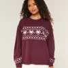 Oversize-Pullover mit Rundhalsausschnitt und Herzmuster Oversize-Pullover mit Rundhalsausschnitt und Herzmuster