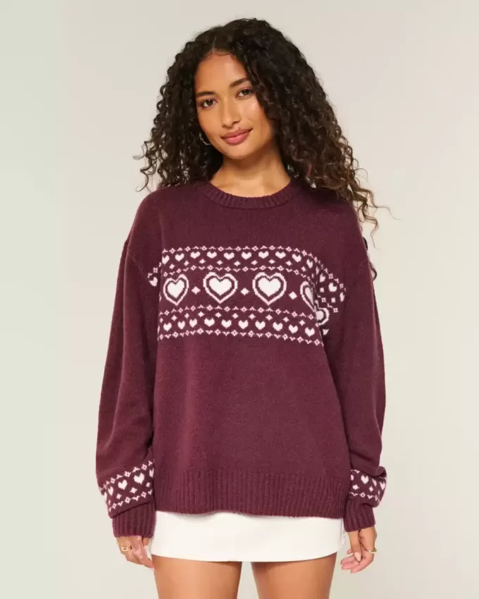 Oversize-Pullover mit Rundhalsausschnitt und Herzmuster Oversize-Pullover mit Rundhalsausschnitt und Herzmuster