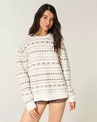 Oversize-Pullover mit Rundhalsausschnitt und Herzmuster Oversize-Pullover mit Rundhalsausschnitt und Herzmuster