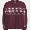 Oversize-Pullover mit Rundhalsausschnitt und Herzmuster Oversize-Pullover mit Rundhalsausschnitt und Herzmuster
