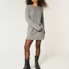 Oversize-Pulloverkleid mit Rundhalsausschnitt und Zopfmuster Oversize-Pulloverkleid mit Rundhalsausschnitt und Zopfmuster