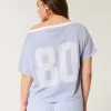 Oversize-Schulterfreies Trikot mit College-Grafik Oversize-Schulterfreies Trikot mit College-Grafik