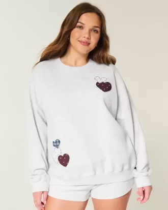 Oversize-Sweatshirt mit Rundhalsausschnitt und Herzgrafik
