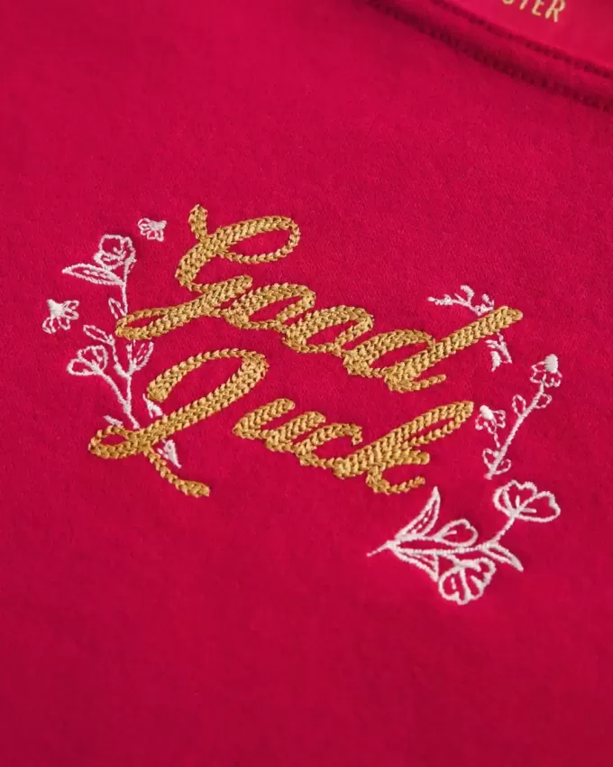 Oversize-Sweatshirt mit schulterfreiem Schnitt und Grafik zum Mondneujahr Oversize-Sweatshirt mit schulterfreiem Schnitt und Grafik zum Mondneujahr