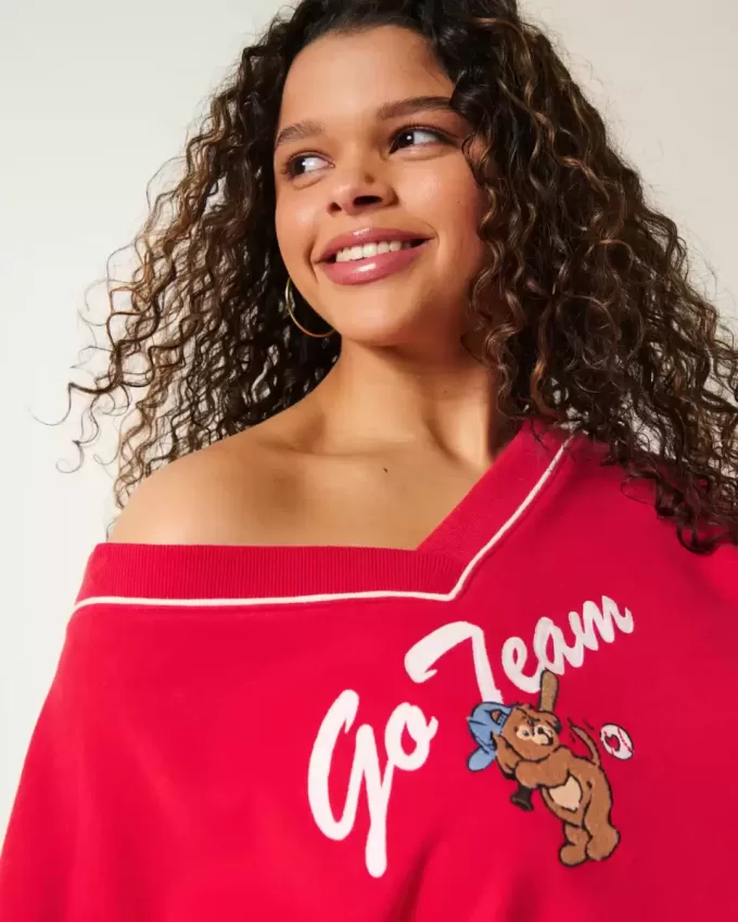 Oversize-Sweatshirt mit V-Ausschnitt und „Go Team“-Grafik Oversize-Sweatshirt mit V-Ausschnitt und „Go Team“-Grafik