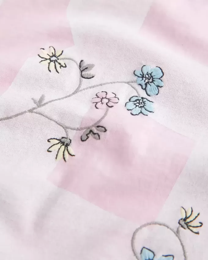 Oversize-T-Shirt mit schulterfreiem College-Blumenmuster Oversize-T-Shirt mit schulterfreiem College-Blumenmuster