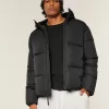 Pufferjacke mit Kunstpelzfutter Pufferjacke mit Kunstpelzfutter