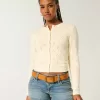 Rundhals-Cardigan mit Ösen Rundhals-Cardigan mit Ösen