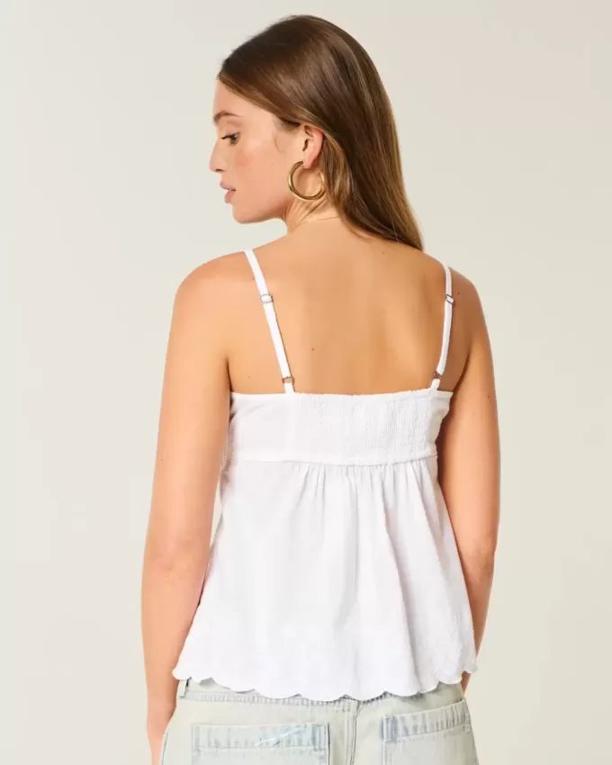 Schimmerndes Babydoll-Oberteil mit Stickerei Schimmerndes Babydoll-Oberteil mit Stickerei