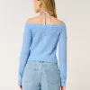 Schulterfreier Pullover im Häkelstil