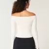 Schulterfreier Zopfmusterpullover