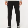 Schwarze, nicht verblassende, sportliche Skinny-Jeans