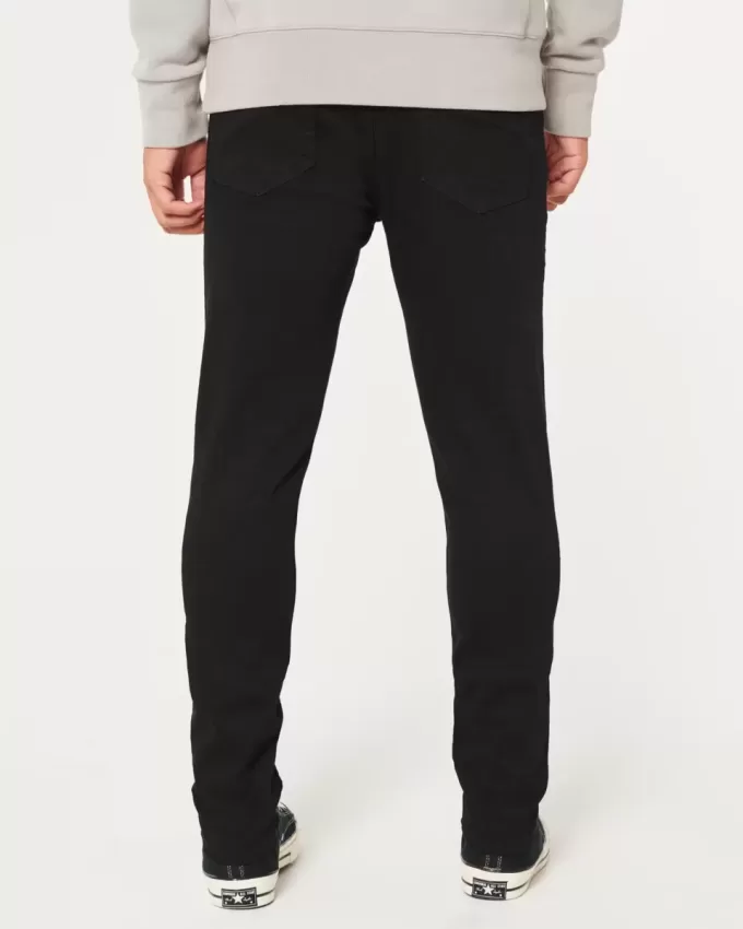 Schwarze, nicht verblassende, sportliche Skinny-Jeans