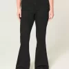 Schwarze Schlagjeans mit hohem Bund Schwarze Schlagjeans mit hohem Bund