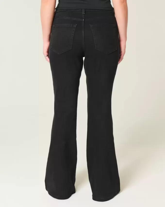 Schwarze Schlagjeans mit hohem Bund Schwarze Schlagjeans mit hohem Bund
