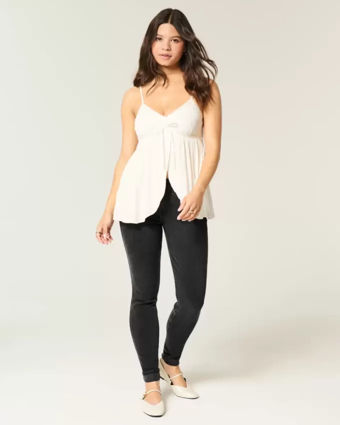 Schwarze Skinny Jeans mit mittelhohem Bund und verwaschenem Schnitt Schwarze Skinny Jeans mit mittelhohem Bund und verwaschenem Schnitt