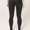 Schwarze Skinny Jeans mit mittelhohem Bund und verwaschenem Schnitt Schwarze Skinny Jeans mit mittelhohem Bund und verwaschenem Schnitt