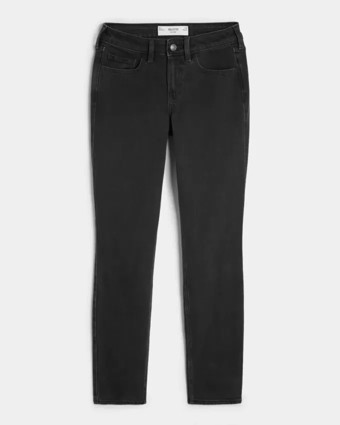 Schwarze Skinny Jeans mit mittelhohem Bund und verwaschenem Schnitt Schwarze Skinny Jeans mit mittelhohem Bund und verwaschenem Schnitt