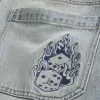 Skater-Baggy-Jeans mit Würfelstickerei in heller Waschung Skater-Baggy-Jeans mit Würfelstickerei in heller Waschung