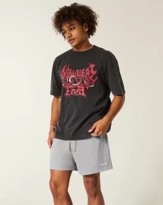 Strick-Fußballshorts mit Logo bis zur Mitte des Oberschenkels